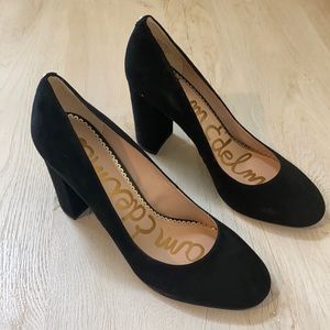 Black suede high heels.